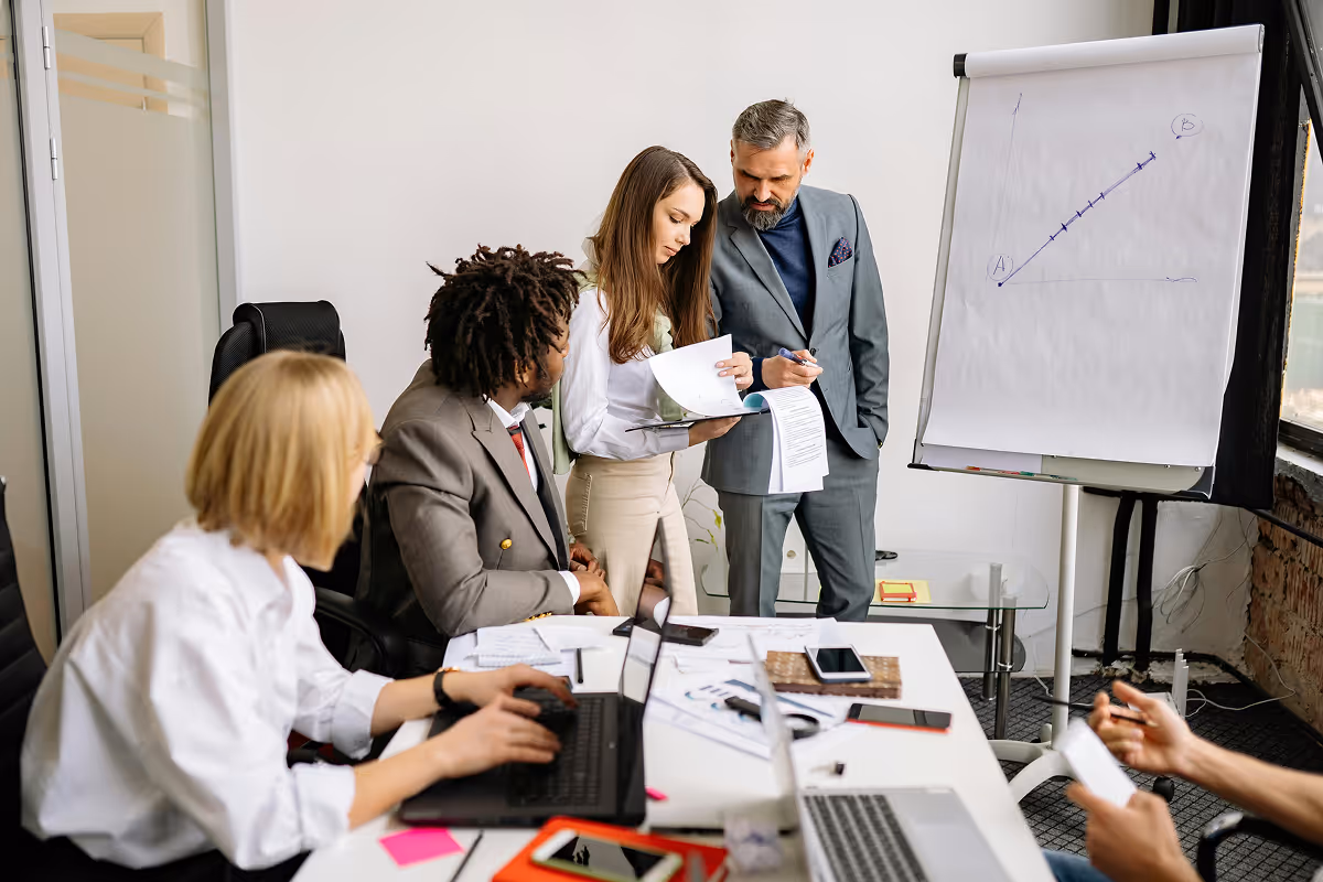 A sales team working closely together